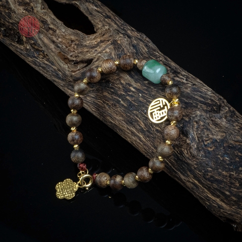 Vòng tay Trầm Hương chìm nước 6 li Hiếm mix Cẩm Thạch và charm vàng