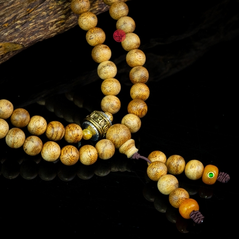 Chuỗi trầm hương 108 hạt 8 li banh mix charm bạc