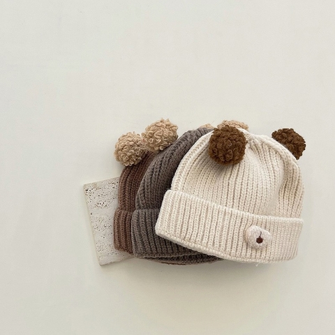 Mũ len tai quả bông