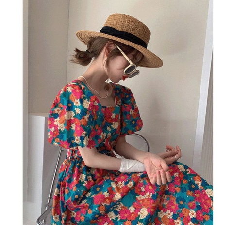 Đầm hoa cam cổ vông dây lưng tay bồng