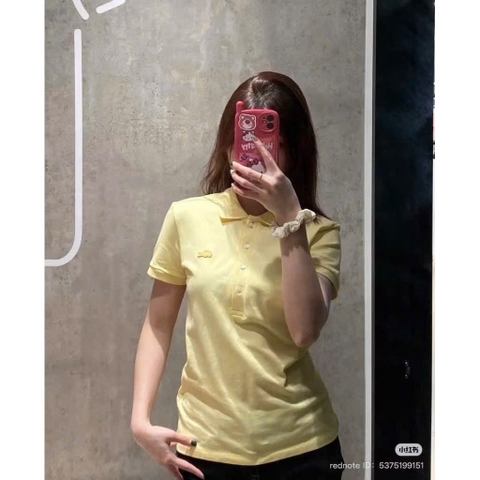 A584- Áo polo Lắc Cọt màu àng nhạt full tem