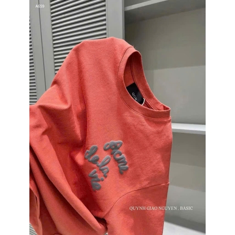 A211-Áo thun suông màu cam in chữ