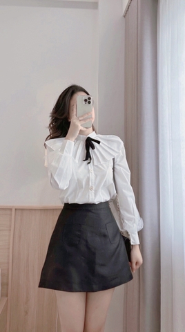 Áo sơ mi  trắng xếp ly cổ đính nơ