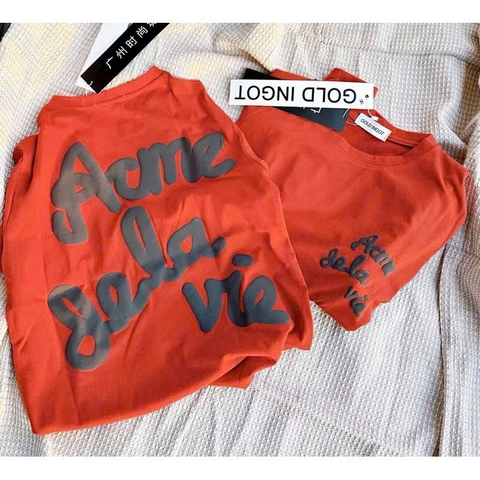 A211-Áo thun suông màu cam in chữ