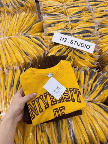 BT456- Bộ ao cotton Unive vàng mix quần cua màu nâu