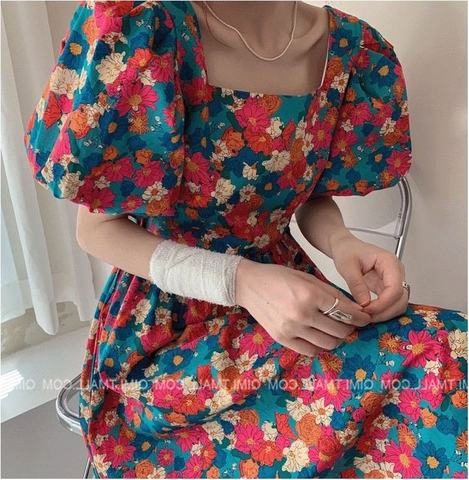 Đầm hoa cam cổ vông dây lưng tay bồng