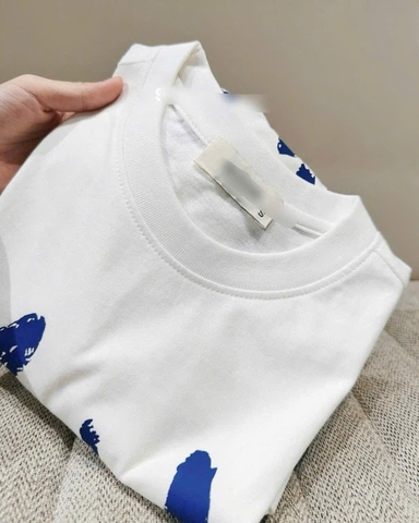 A331- Áo thun trắng dáng suông in hình cún xanh