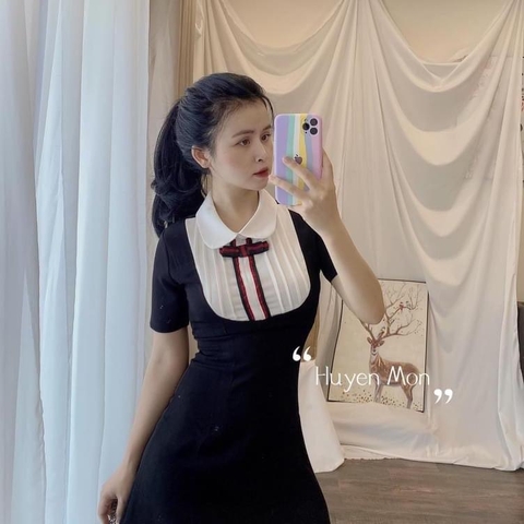 Đầm xoè cổ yếm đính nơ đỏ