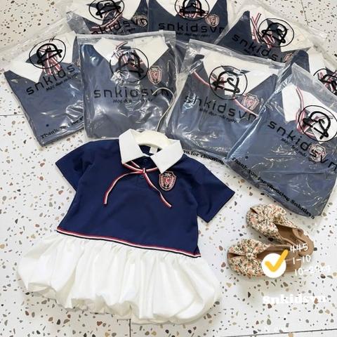 Bt577-  đầm bé gái màu than huy hiệu đuôi trắng