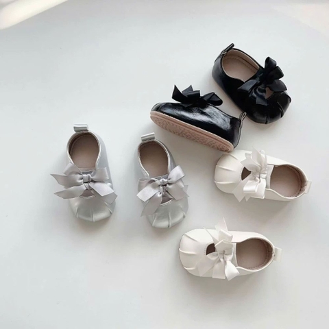 Giày da tập đi 2 nơ vải mềm chống trượt cho bé gái