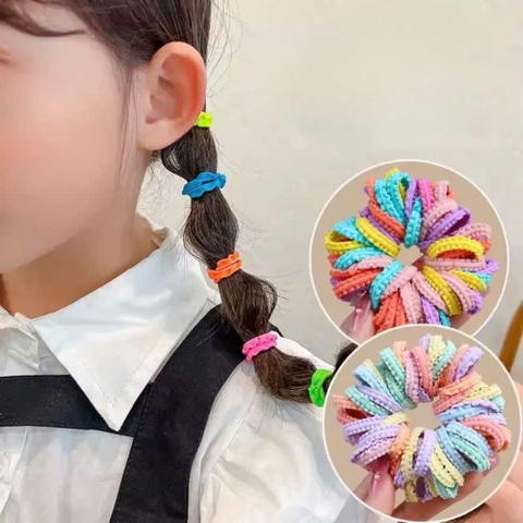 Hộp trụ đựng chun cột tóc nhiều màu cho bé