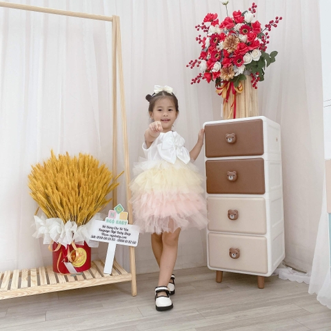 Đầm xoè ren nhiều tầng nơ ngực kèm cài tóc
