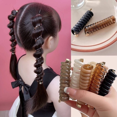 Dây buộc tóc lò xo đính hoa