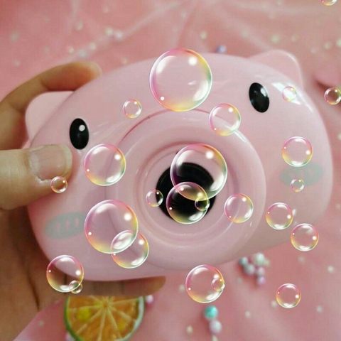 Máy Thổi Bong Bóng Mặt Heo Xài Pin Tiểu Hình Máy Ảnh