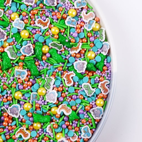 นักเก็ตน้ำตาลผสมรูปไดโนเสาร์ (ถุง 100 กรัม)