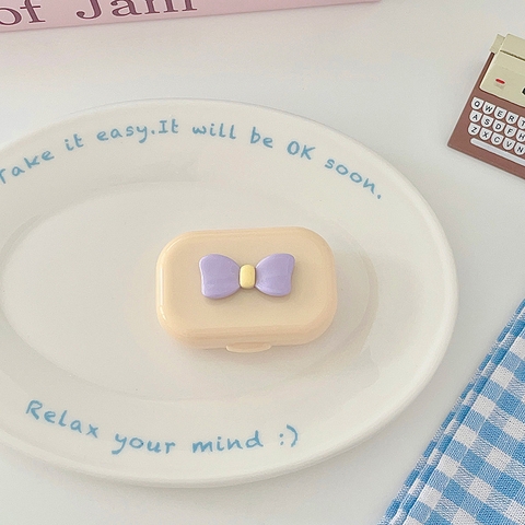 Khay gương gắn nơ kèm dụng cụ đeo