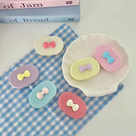 Khay gương gắn nơ kèm dụng cụ đeo