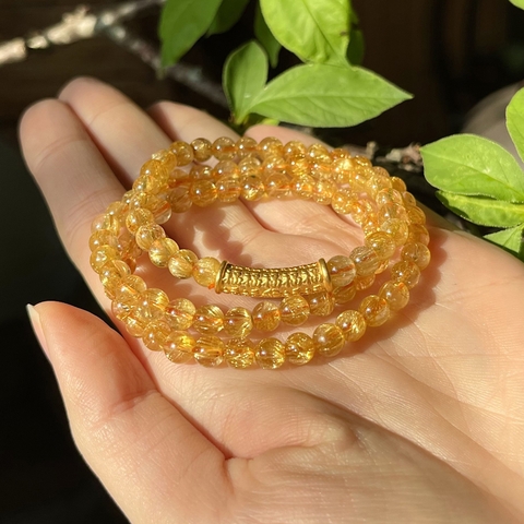 Vòng Thạch anh tóc vàng mix Charm Lục đại Thần chú Om Ma Ni