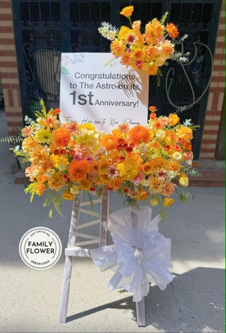 Kệ hoa khung tranh tone cam vàng chúc mừng khai trương ở Hà Nội ! Hoa khai trương Hà Nội