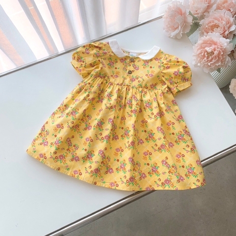 Đầm hoa vàng cổ sen trắng Op Kids