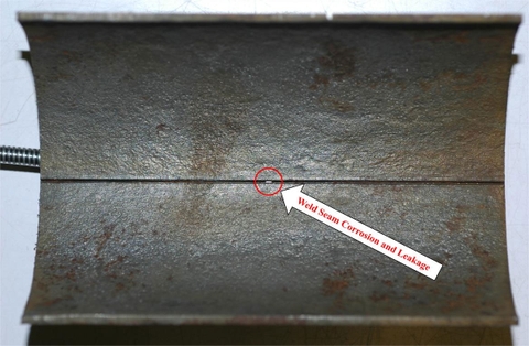 Hình Ăn mòn rãnh tại mối hàn ống với lỗ rò kim 1 mm trong hệ ống ướt