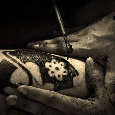 Tìm hiểu về tục xăm mình của Người Việt