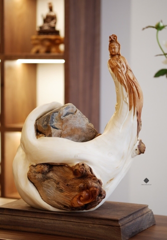 Tượng Quan Âm thí nguyện lũa nhai bách ôm đá