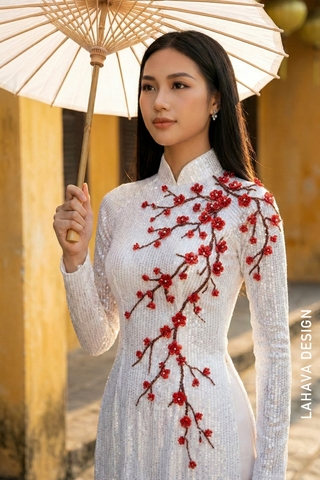 Áo dài trắng vải kim sa đính kết hoa ấn tượng