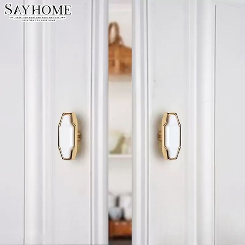 Núm tủ tân cổ điển vintage màu vàng gold gốm sứ SH1063