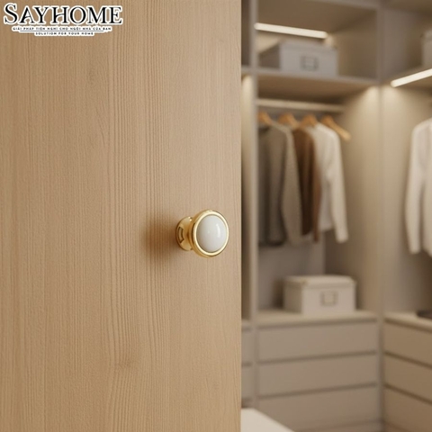 Núm tủ hiện đại màu vàng gold mặt sứ trắng SH9021