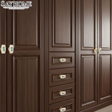 Núm tủ tân cổ điển vintage gốm sứ hoa văn hai màu vàng gold và đồng đen SH9024