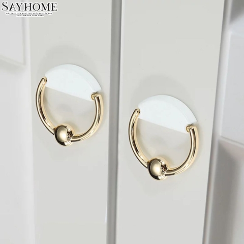Tay nắm tủ khoen tròn hiện đại màu vàng gold trắng SH1010