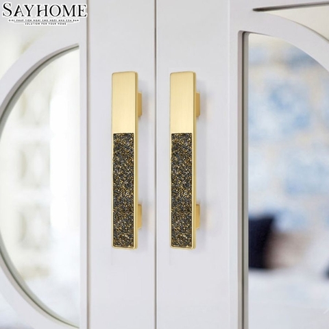 Tay nắm tủ hiện đại màu vàng gold khảm đá SH8971