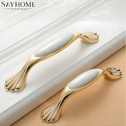 Tay nắm tủ tân cổ điển Vintage màu vàng mặt sứ trắng không hoa văn SH1802