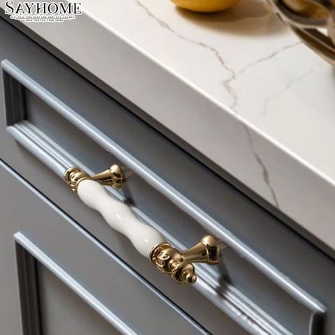 Tay nắm tân cổ điển Vintage màu vàng mặt sứ trắng SH2028