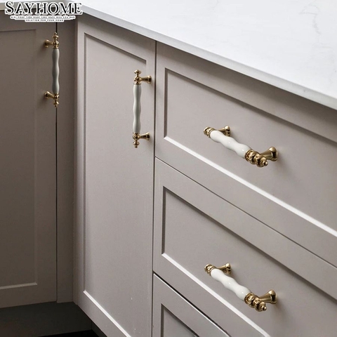 Tay nắm tân cổ điển Vintage màu vàng mặt sứ trắng SH2028