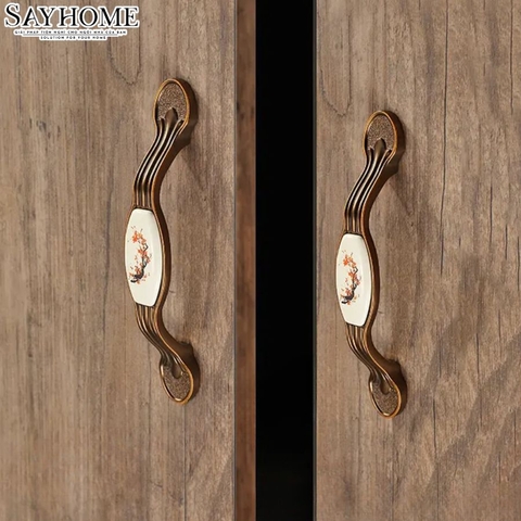 Tay nắm tủ tân cổ điển vintage màu đồng mặt sứ trắng SH9023