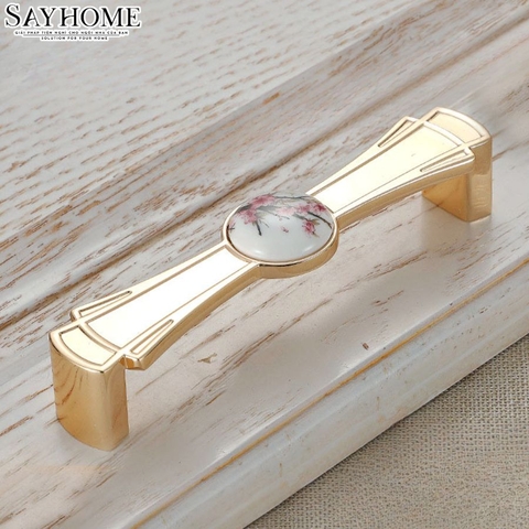 Tay nắm tủ tân cổ điển Vintage màu vàng gold mặt sứ trắng SH1070
