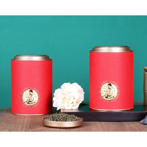 SET QUÀ TANG Lon thiếc giấy tròn đựng trà sáng tạo in hình ông già nhiều màu sắc-Phukientuiloc