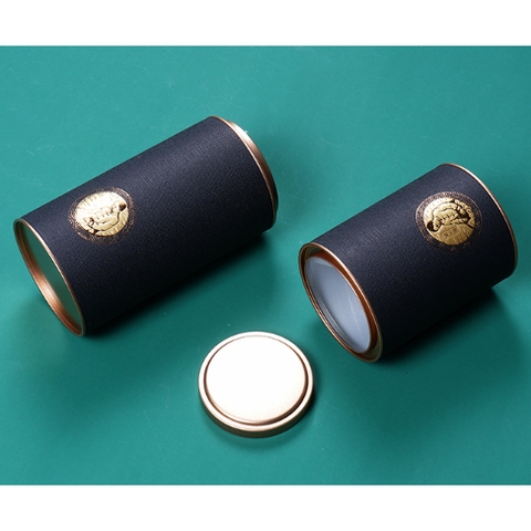 SET QUÀ TANG Lon thiếc giấy tròn đựng trà sáng tạo in hình ông già nhiều màu sắc-Phukientuiloc