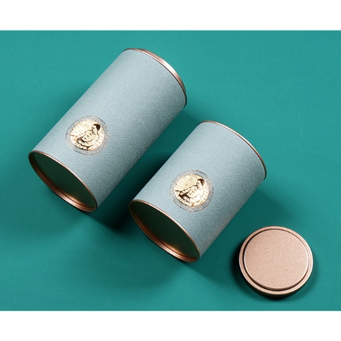 SET QUÀ TANG Lon thiếc giấy tròn đựng trà sáng tạo in hình ông già nhiều màu sắc-Phukientuiloc