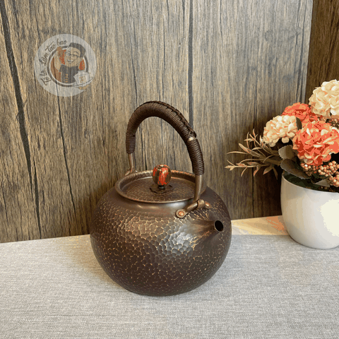 Ấm đồng nguyên khối