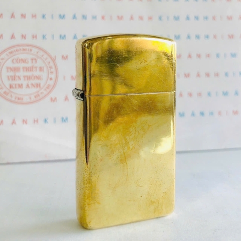 Bật lửa Zippo Slim Mỹ Brass trơn sản xuất 1989, Cam kết hàng chính hãng có giấy Hải quan gửi kèm theo đơn hàng