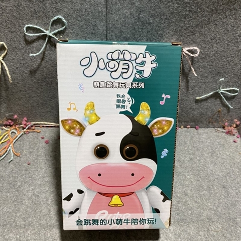 Đồ chơi chú bò sữa biết nhảy, hát, dùng pin
