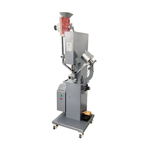 Máy đục lỗ và đóng khoen tự động