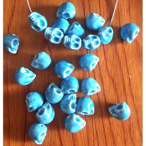 Hạt gốm sứ đầu lâu xanh 12x16mm -gói 10 cái