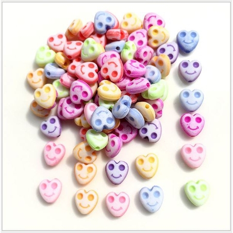 #P117-32 gói 10-50gam hạt nhựa trái tim khắc mặt cười 8mm màu mờ