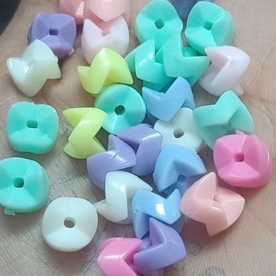 #P117-61 gói 10-50gam hạt nhựa tròn gợn sóng 3 cạnh 6x9mm