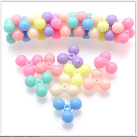 #P117-44 gói 10-50gam hạt nhựa hoa bi 3 cánh 6x14mm