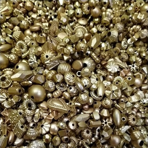 Gói 25gam hỗn hợp hạt charm nhựa màu vàng